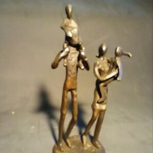 Vintage bronze family together sculpture